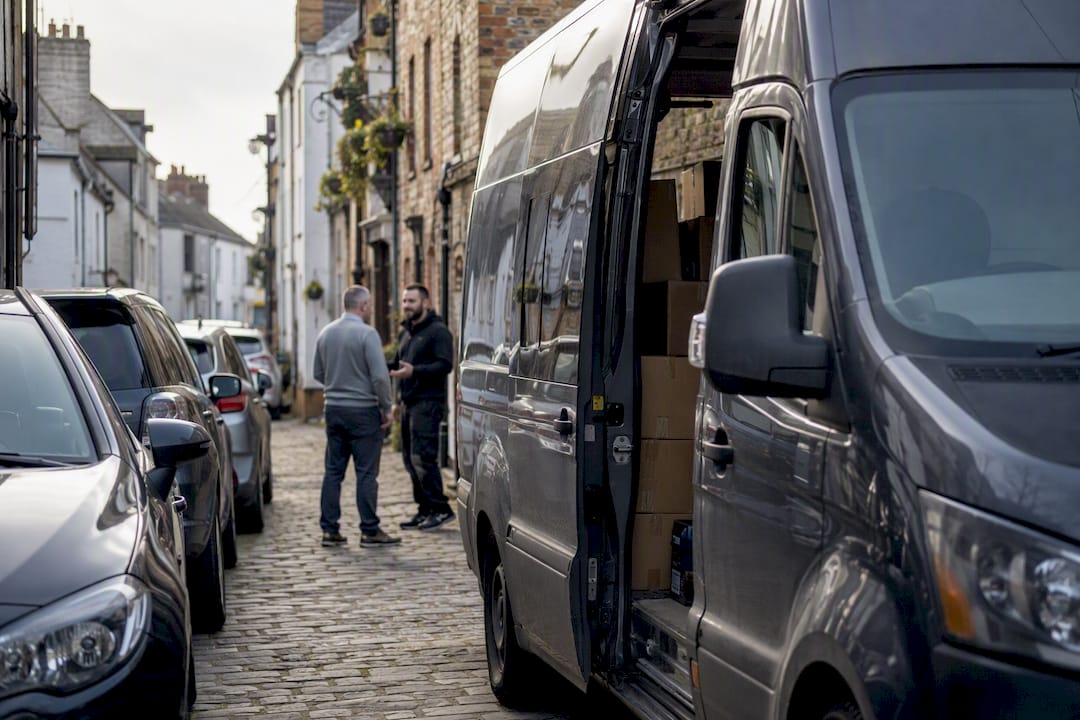 Removals van parked in tight street